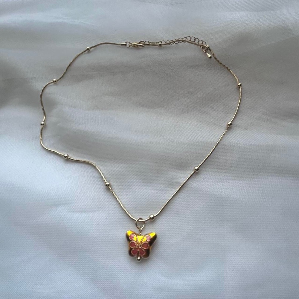 Dainty orange butterfly necklace